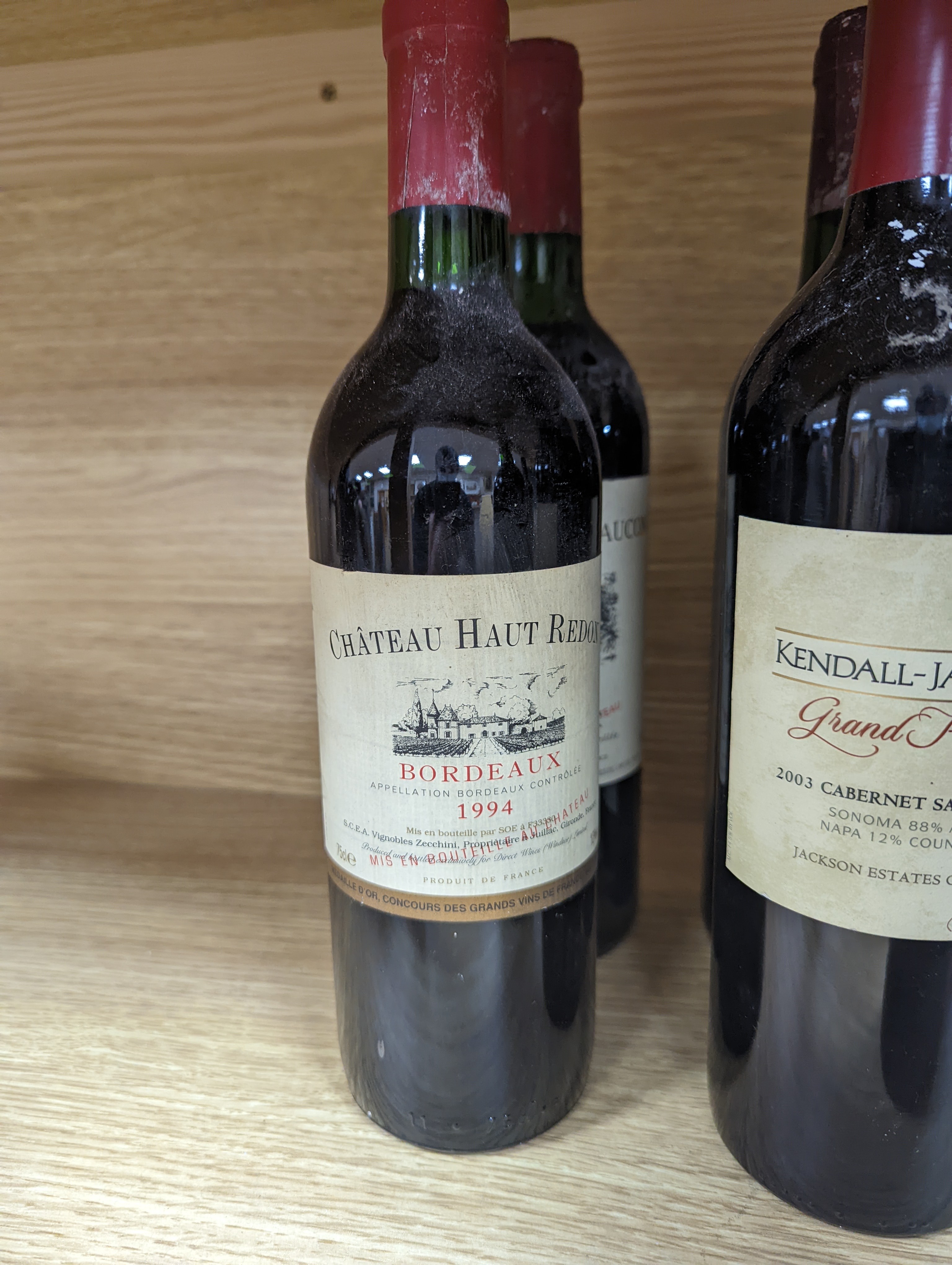 Twelve assorted bottles of wine including one Opus One, 1988, one Vosne Romanee, Jean Paul Selles, 1992, one Chateau Cazauviel, Margaux 1993, Chateau Pontet-Canet, 1986 and Brunello Montalcino, 1985 & 1991 etc.